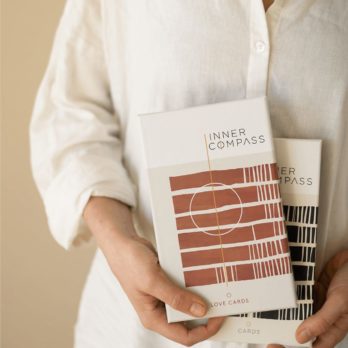 Neel van Lierop holds the Inner Compass Original and Love cards